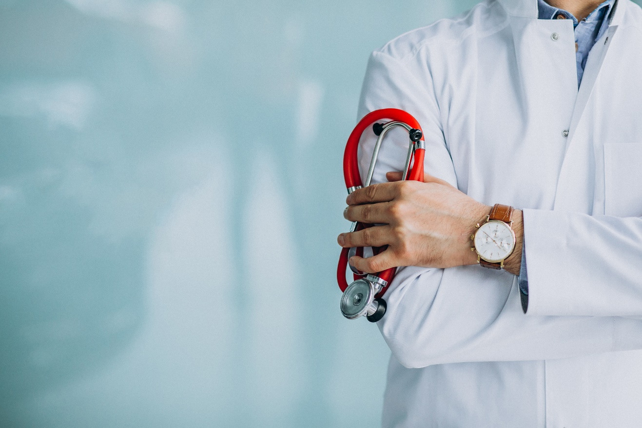  Family Medicine Doctor Checking Patient’s Blood Pressure 