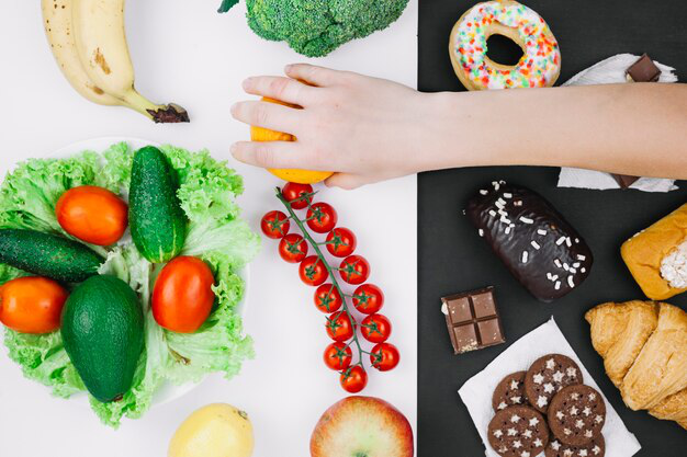 A person choosing healthy food options as part of a weight management plan.