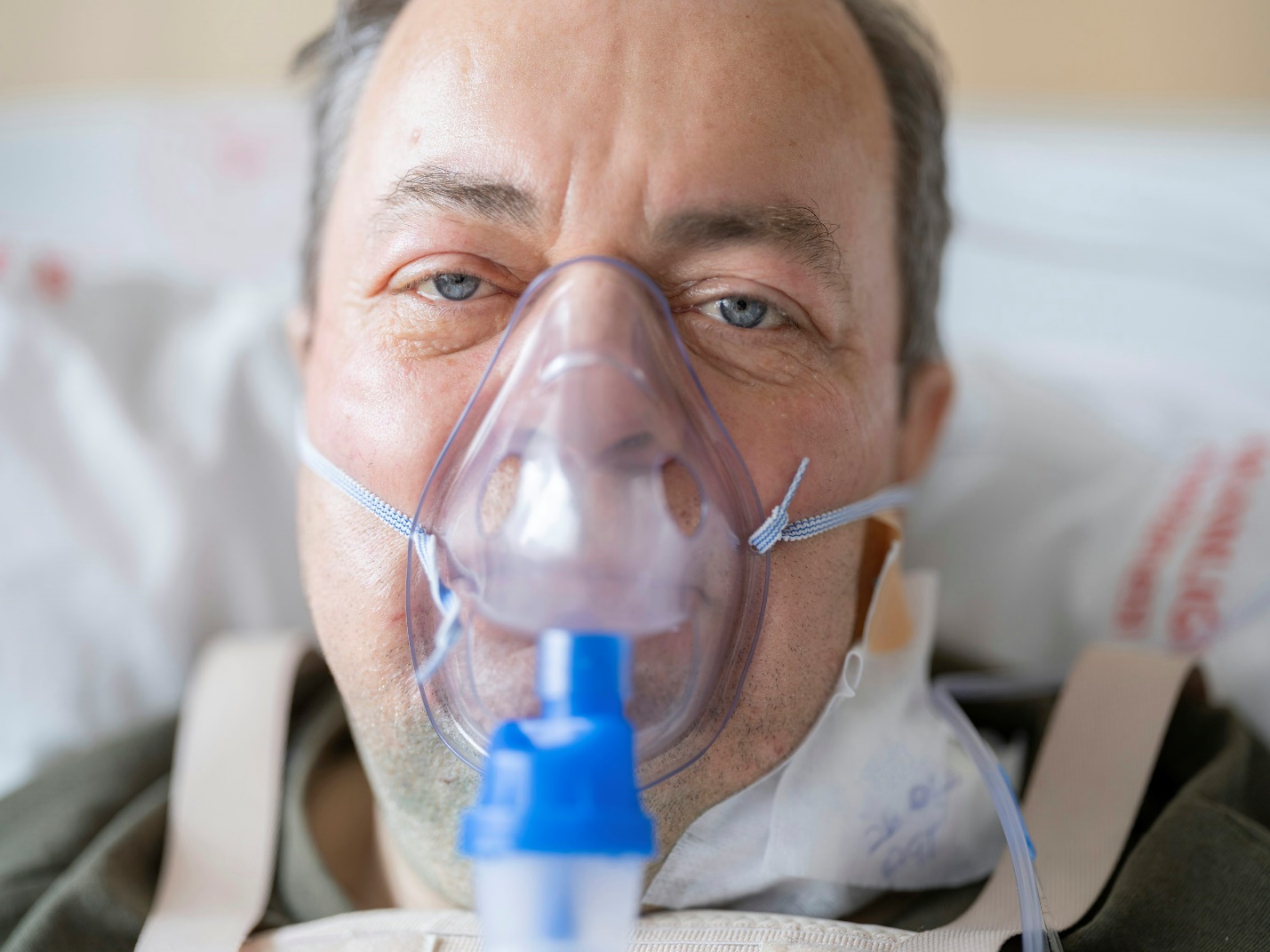 A man wearing an oxygen mask